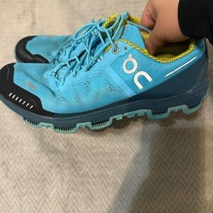 On Running Turquoise and Yellow Sneakers